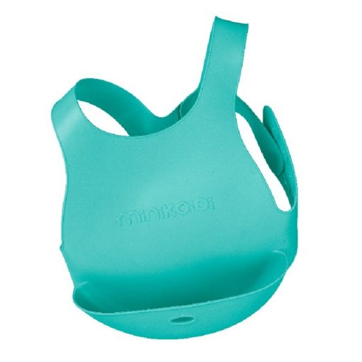 Bavoir avec système d'attache au dos de marque Minikoioi en silicone pour bébés dès 6 mois et toute l’enfance. Souple et facilement transportable, il accompagnera votre bébé durant ses premiers repas et préservera ses habits.